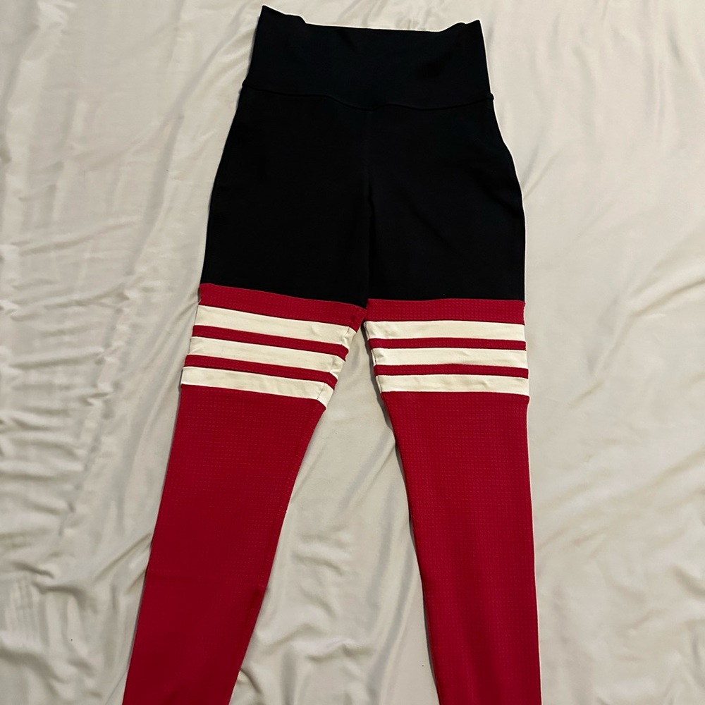 Bombshell Sportswear woman’s Black and Red Leggings